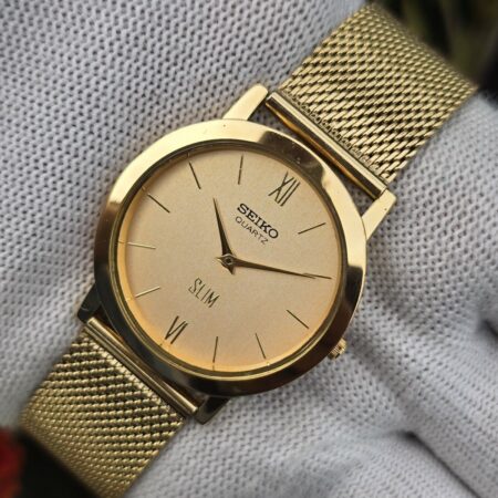 Seiko Quartz Slim Men's Gold tone Champagne gold dial Mod wrist watch
