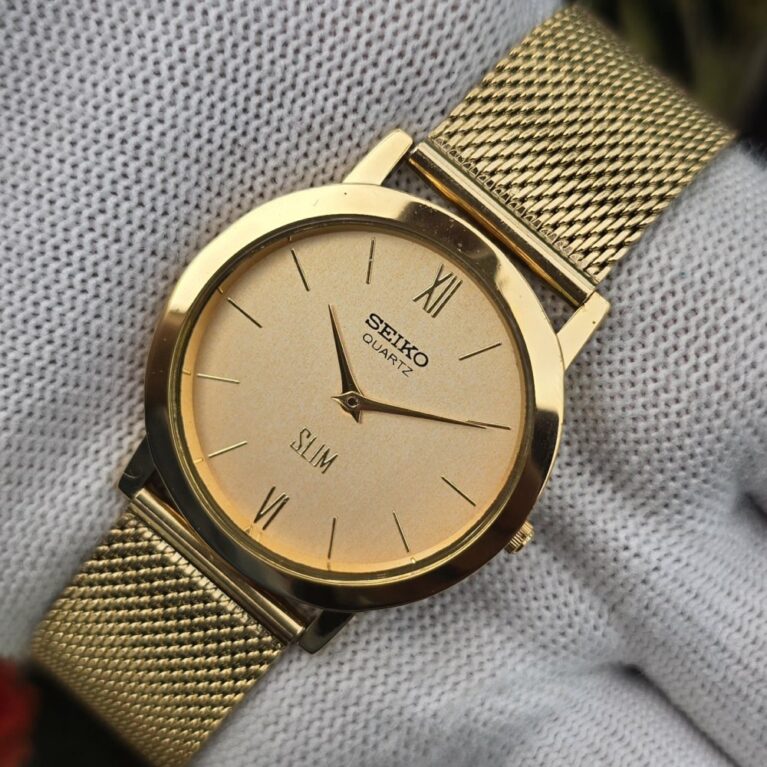 Seiko Quartz Slim Men's Gold tone Champagne gold dial Mod wrist watch